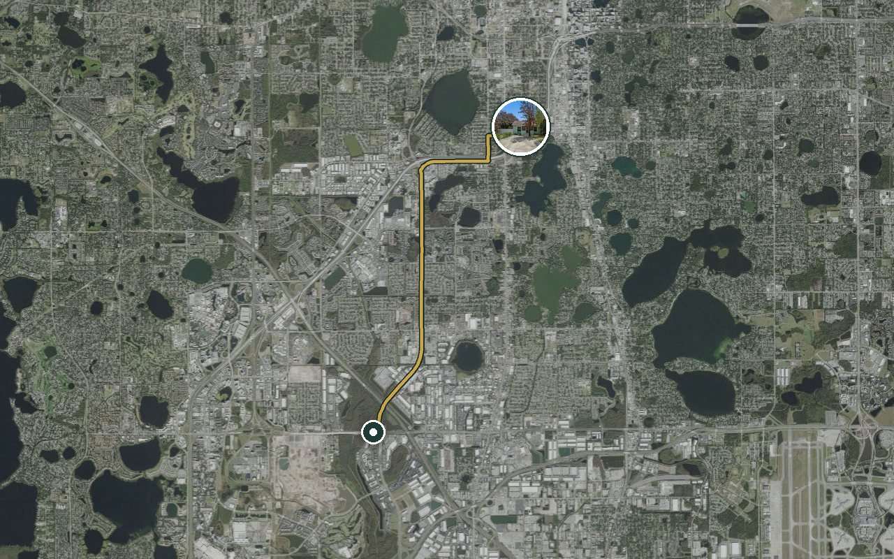 Satellite map showing Fruit Tree Home, our nearest home, and the driving route to FIS (Orlando), about 11 minutes by car.