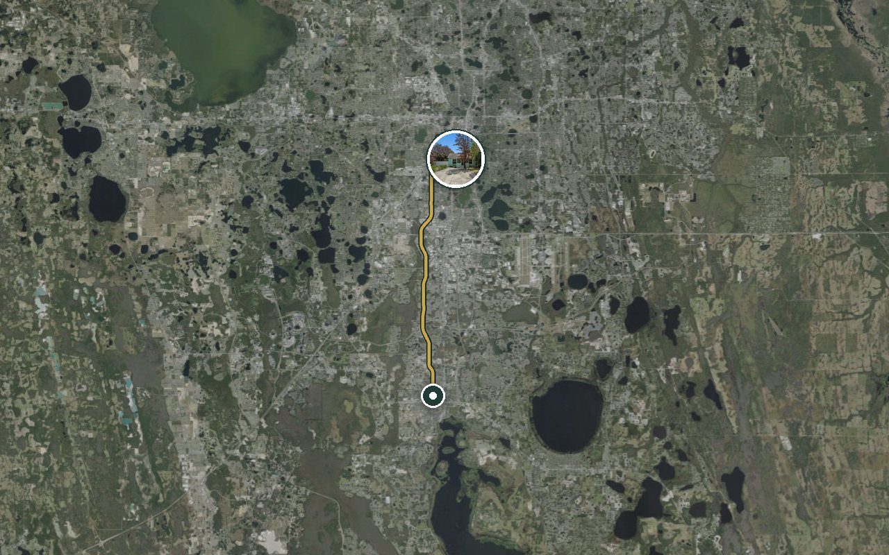 Satellite map showing Fruit Tree Home, our nearest home, and the driving route to Jr. Davis Construction (Kissimmee), about 26 minutes by car.
