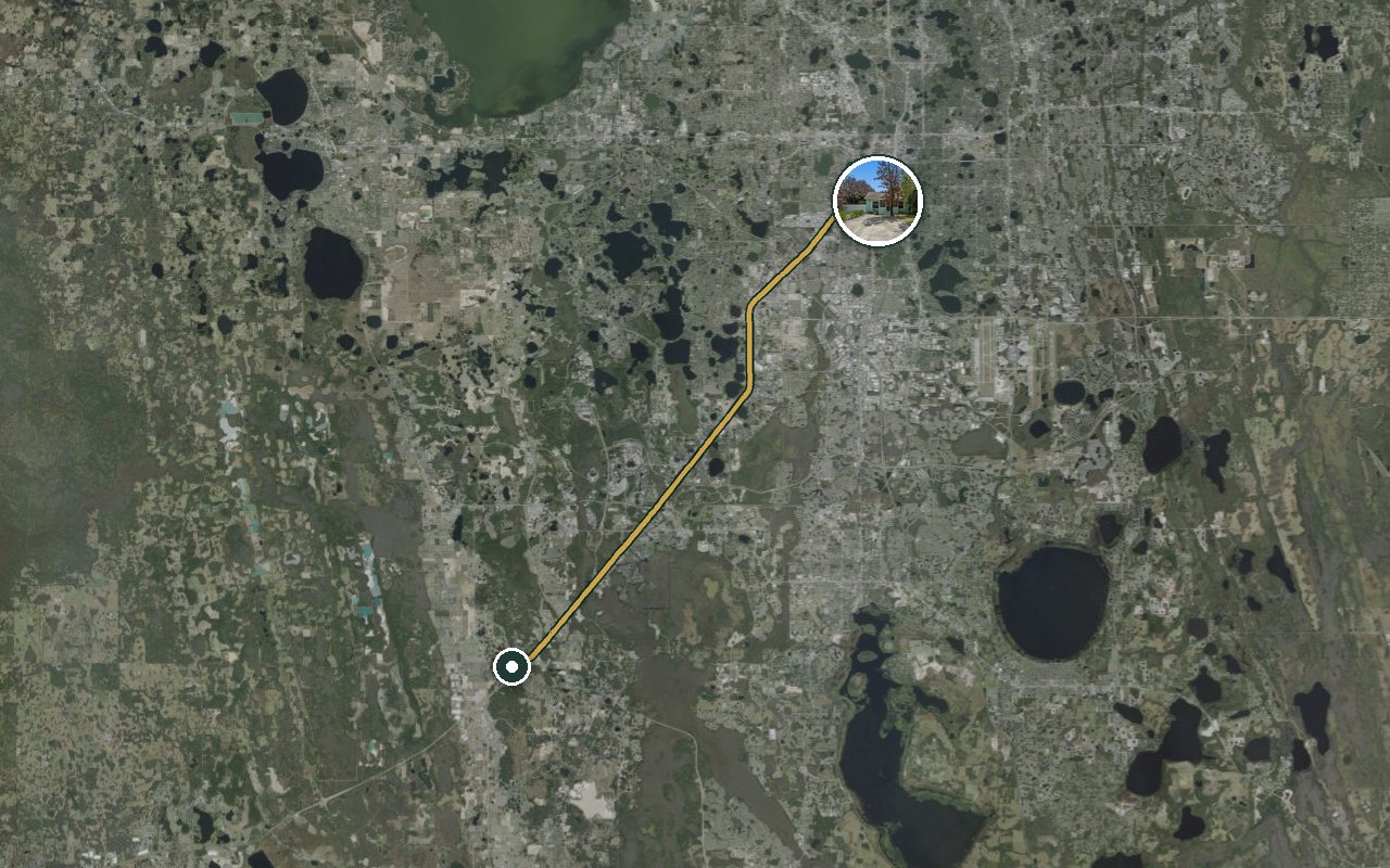 Satellite map showing Fruit Tree Home, our nearest home, and the driving route to Omni Orlando Resort at ChampionsGate, about 32 minutes by car.