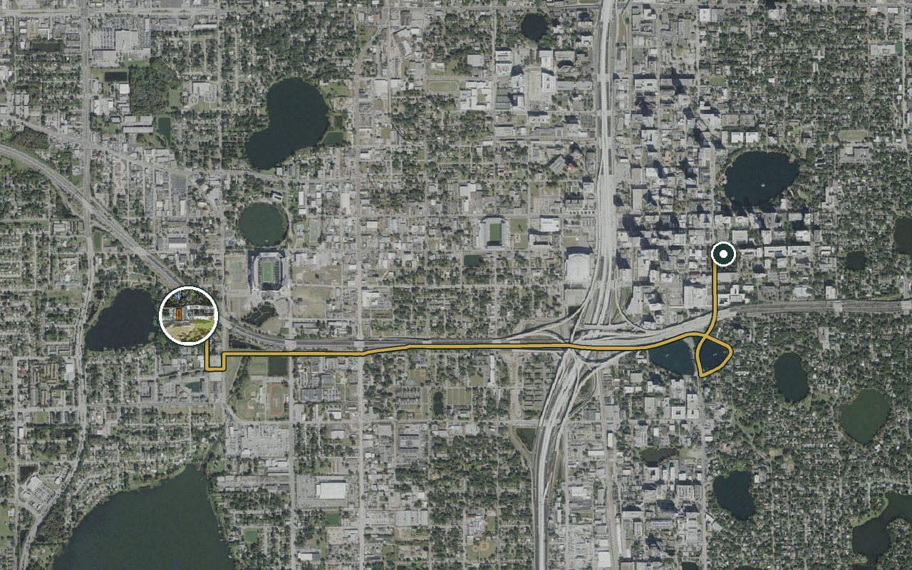 Satellite map showing Game Day Getaway-Downtown Orlando, our nearest home, and the driving route to County administration center, about 7 minutes by car.
