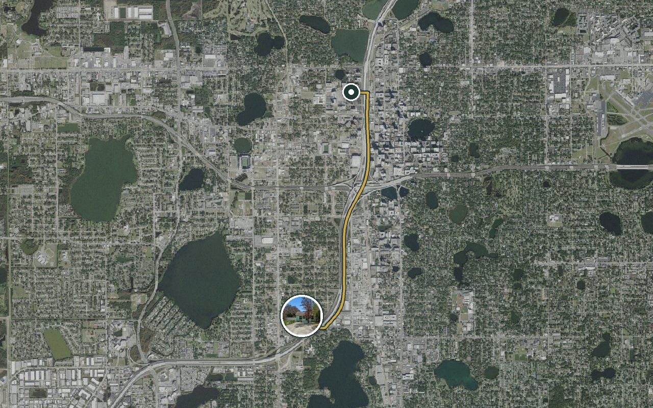 Satellite map showing Fruit Tree Home, our nearest home, and the driving route to OCPS headquarters (W Amelia St), about 5 minutes by car.