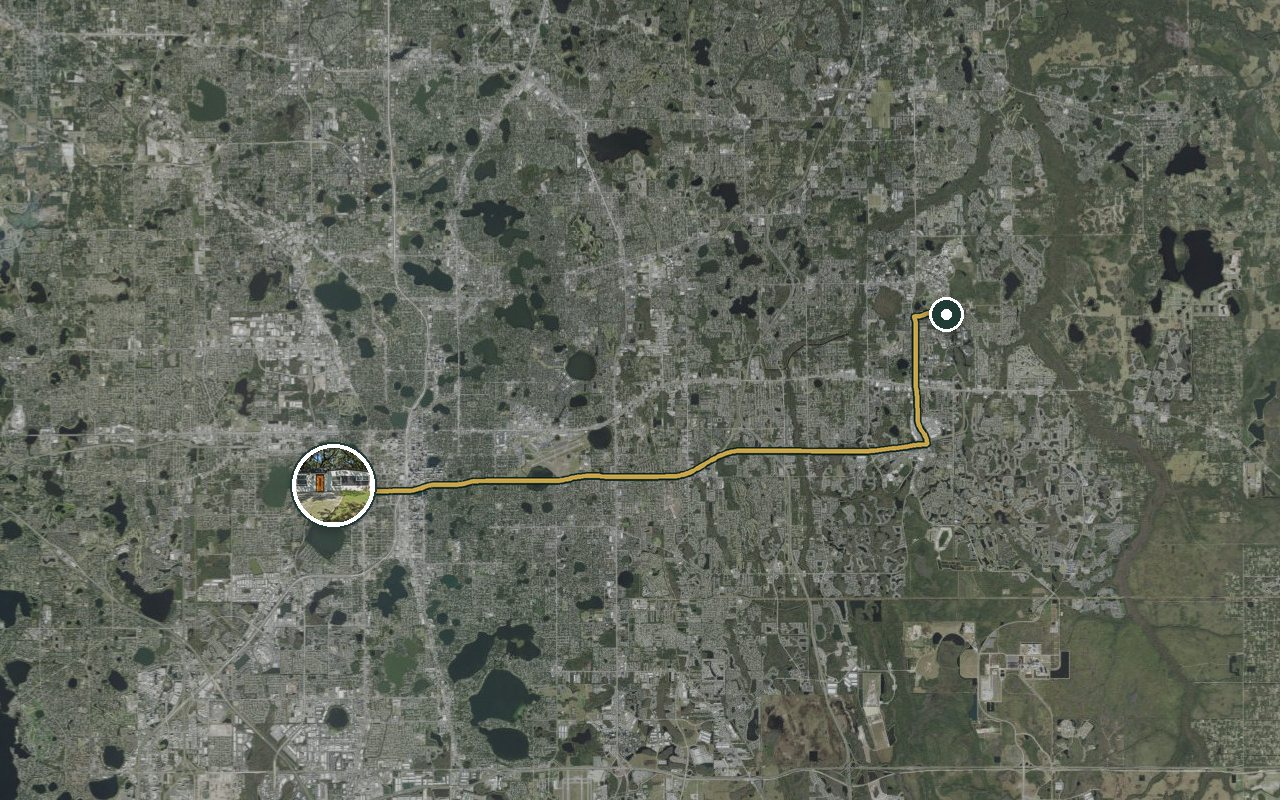Satellite map showing Game Day Getaway-Downtown Orlando, our nearest home, and the driving route to Central Florida Research Park, about 26 minutes by car.