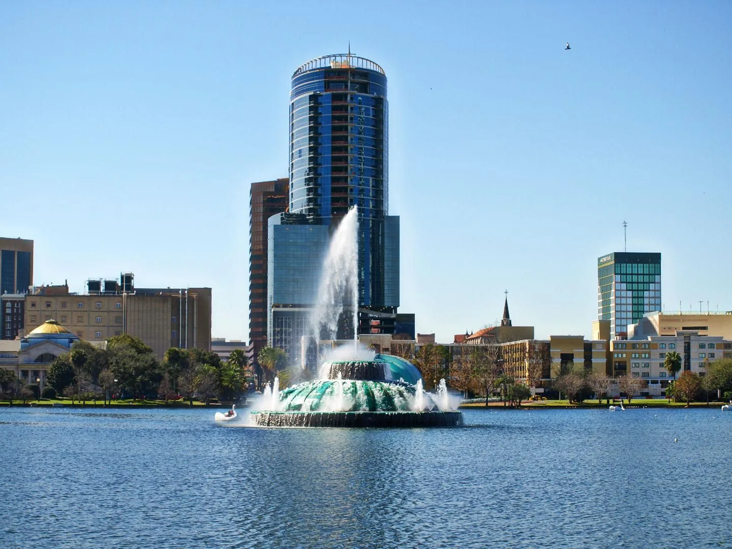 Lake Eola Park and its fountain, a few minutes from the downtown-edge homes