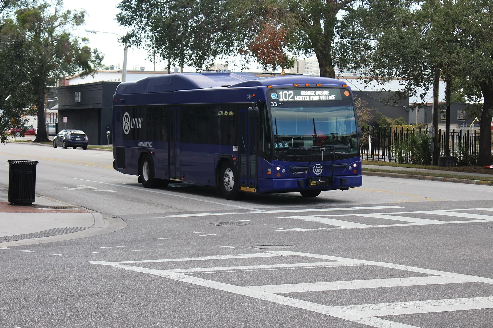 A LYNX bus on its route; LYNX buses run the main roads through this part of northwest Orlando, though there is no rail line out this far