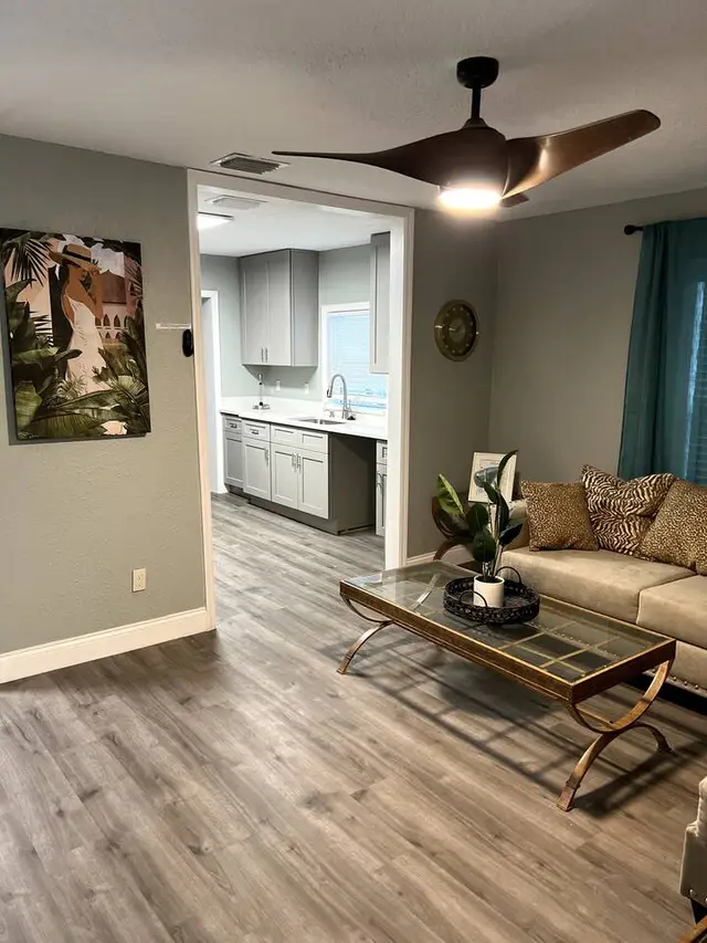 Living room and kitchen entryway at Fruit Tree Home