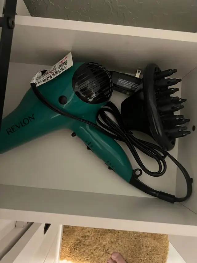 Hair blow dryer in master bedroom at Fruit Tree Home