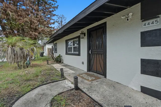 Inviting front entry with covered porch and charming curb appeal at Piedmont