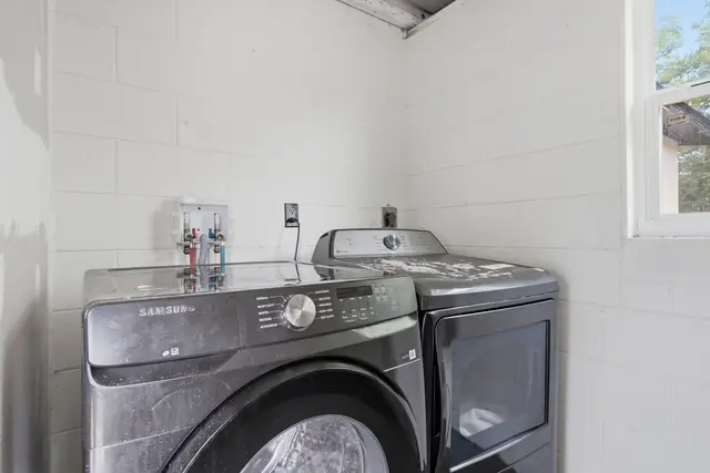 Convenient in-home laundry with modern washer and dryer at WinterPark Home