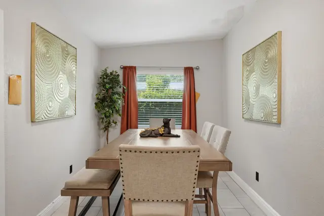 Bright, stylish dining room with seating for group meals at The Clue House