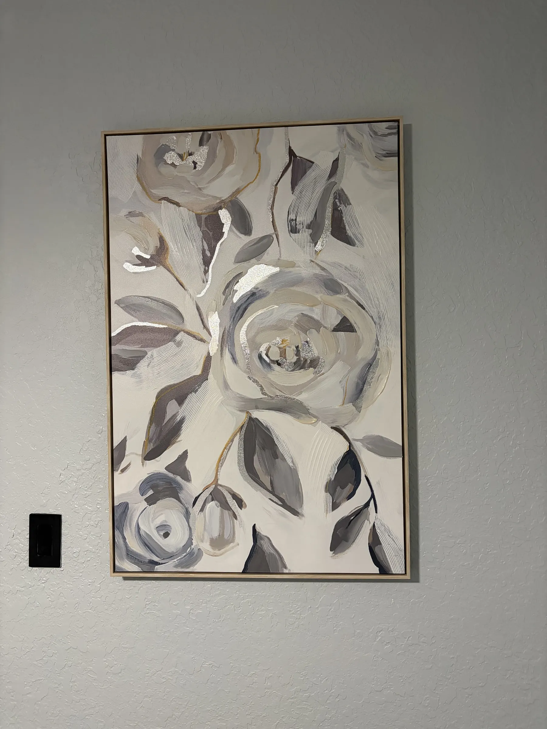 Calming floral canvas adds a chic, modern touch to this serene space. at Downtown & Stadium Cozy Retreat, a Libema home in Orlando